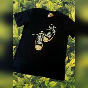 Black Graphic Tee with Sneakers Design